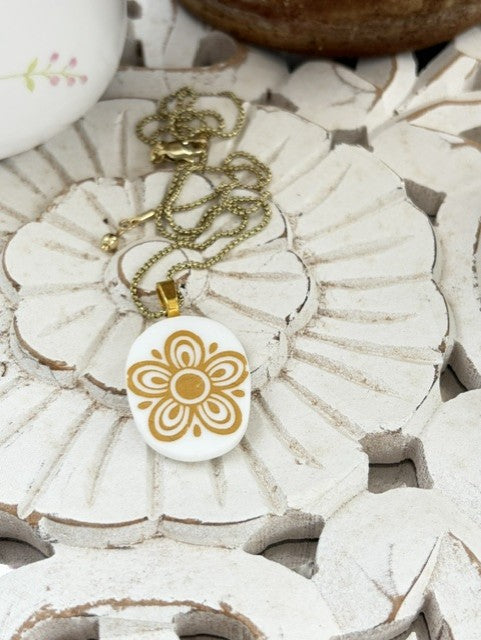 Corelle Gold Flower Pendant